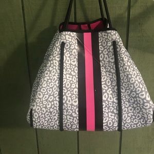 Leopard print neoprene tote bag. Crease is better now. I have carried it a few